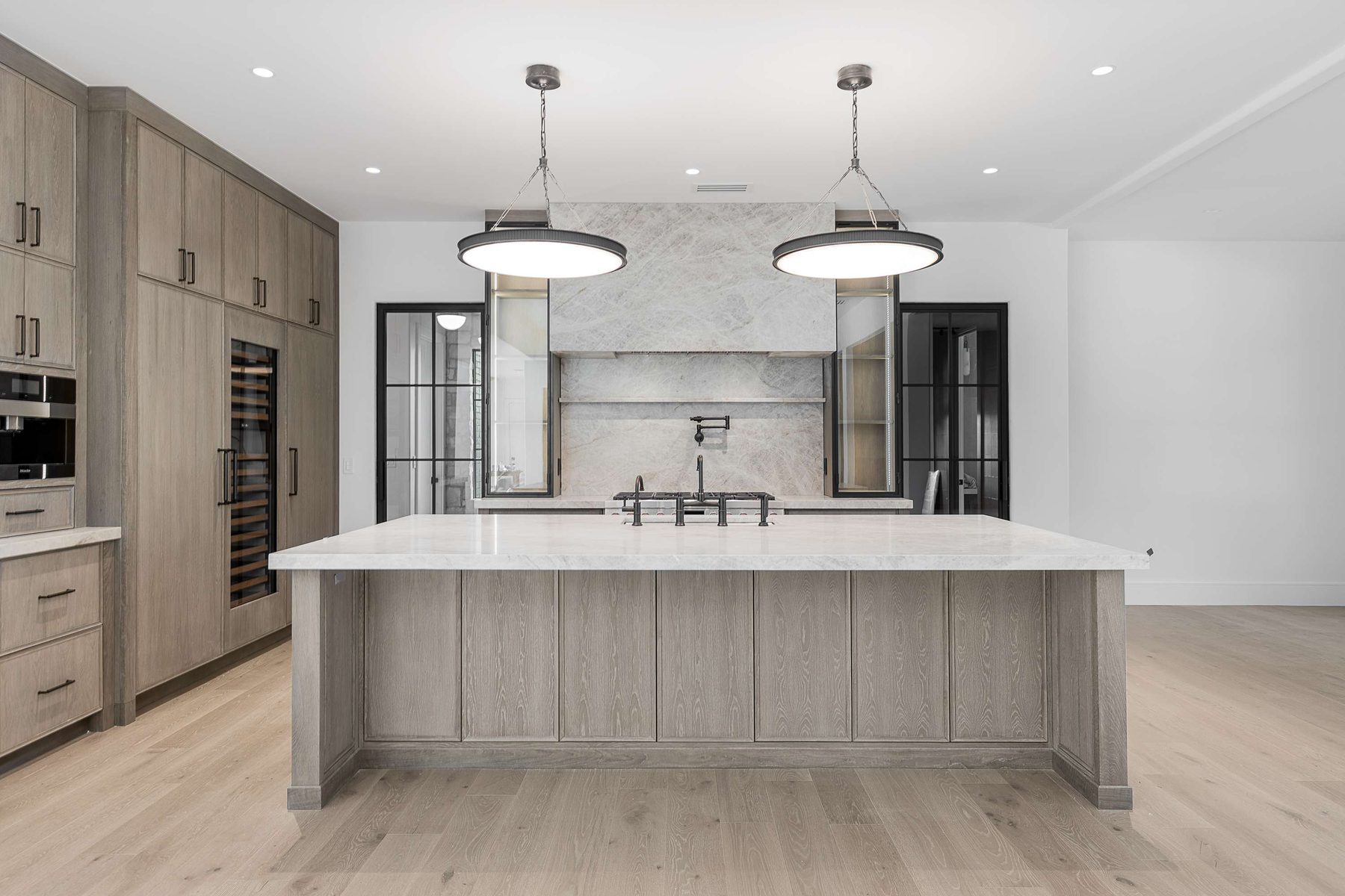 Chef’s kitchen in a Brookhaven custom home built by VIBE